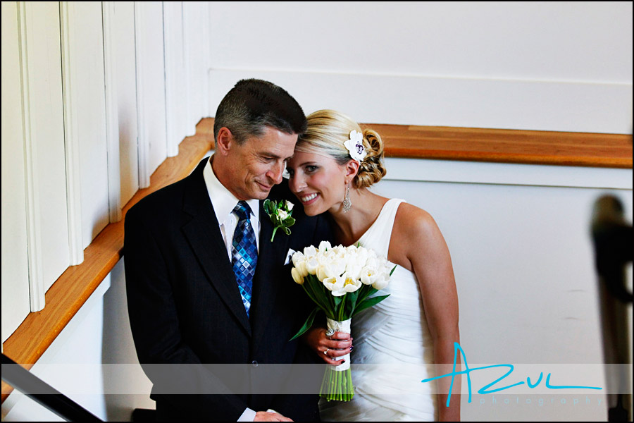 Father & daughter share a smile before walking down the aisle. Wedding day smile photographed in downtown Raleigh
