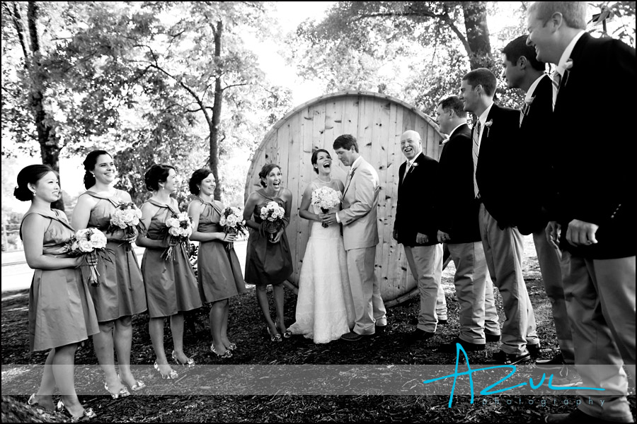 Bridal party with the bride and groom behind the bucket Raleigh NC wedding bridal party portrait photographer
