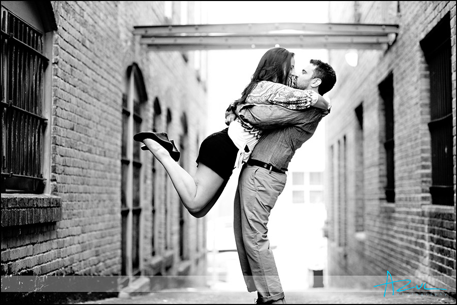The lift and kiss Raleigh NC creative engagement photographer