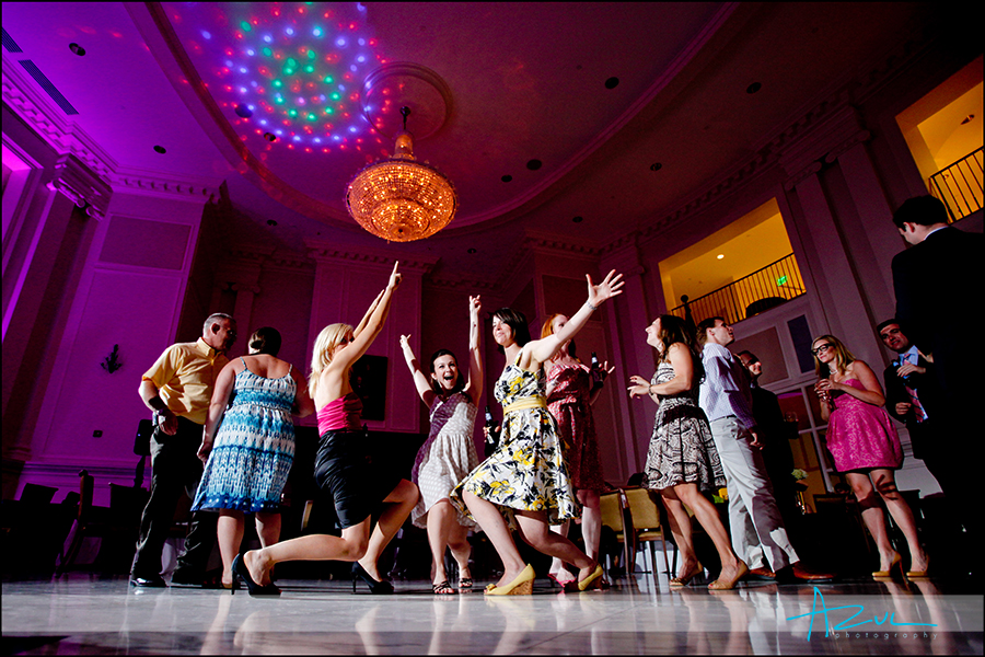 Dancing under the lights Creative Raleigh wedding reception photographer NC