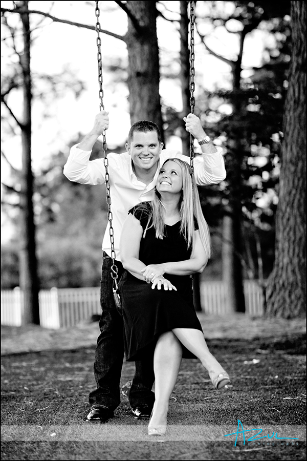 Swing portrait of Melissa & Kris Traditional wedding engagement portrait session Raleigh NC