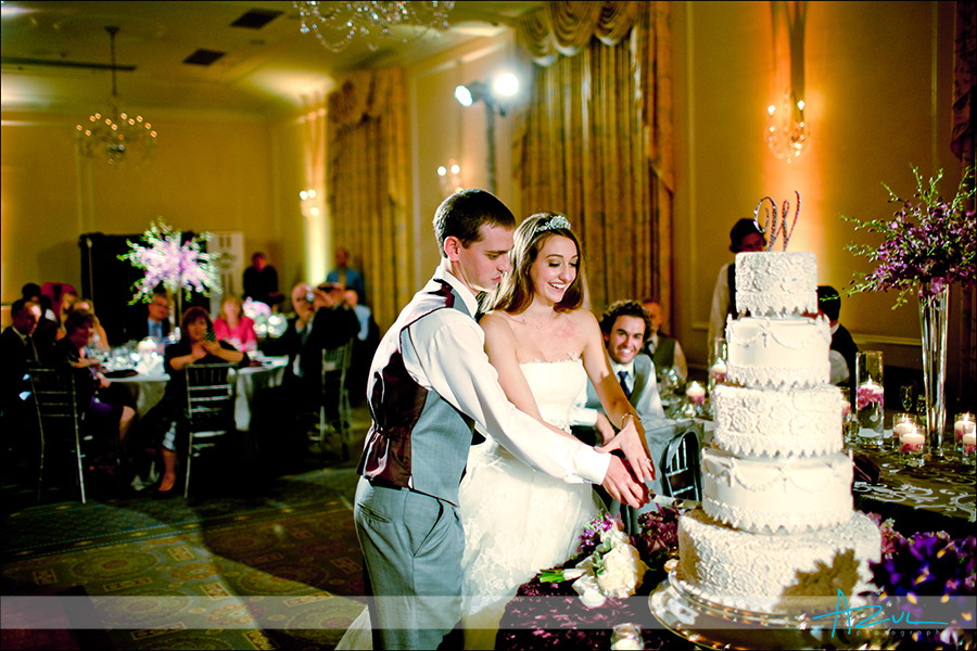 Cake cutting Art of Cake Raleigh NC perfect wedding day cake